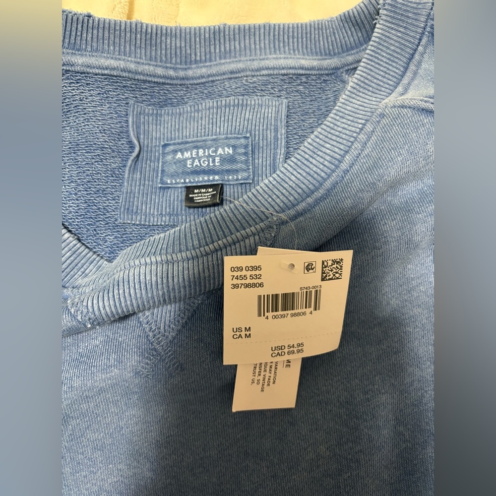 American Eagle baby doll sweater dress. Size medium. Brand new still has tags on